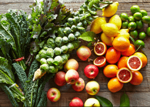 a group of fruits and vegetables on a wood surface Healthy Weight Loss Diets Egham